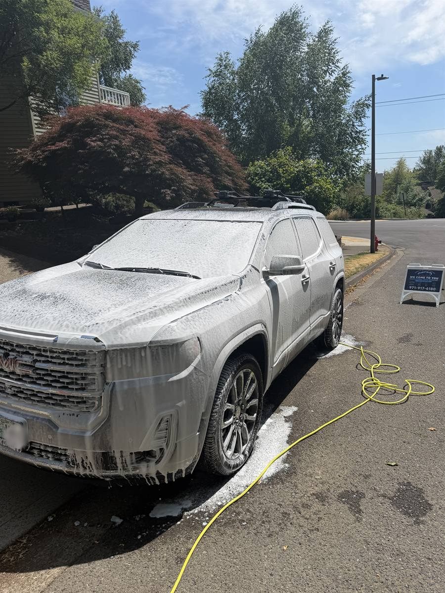 GMC covered in foam curbside